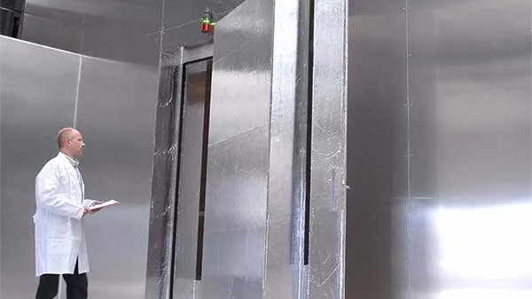 Warmup research and development centre: test chamber and an engineer in the laboratory